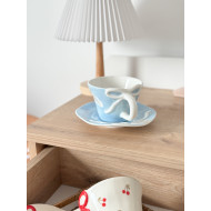 فنجان غيوم وفيونك