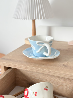 فنجان غيوم وفيونك