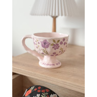 كوب مع يد طويلة وقاعدة