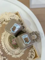 كوب عشاق القهوة يد لؤلؤية