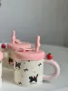 كوب مع غطاء و مصاصة