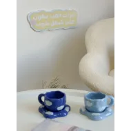 فنجان حجم صغير مع طباعة غيوم