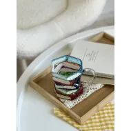 كوب زجاج على شكل كتب